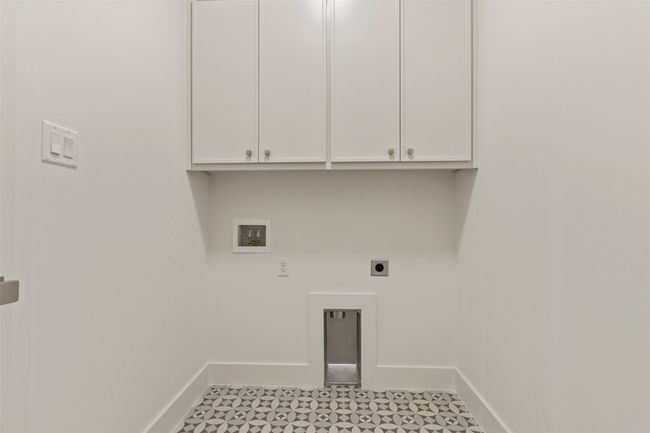 Laundry with custom cabinets, full size hook-ups | Image 27