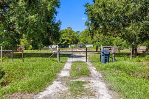 3207 Cypress Trails Dr, POLK CITY, FL, 33868-9487 | Card Image