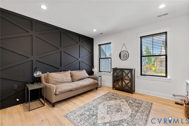 Living area featuring light wood-type flooring and recessed lighting | Image 29