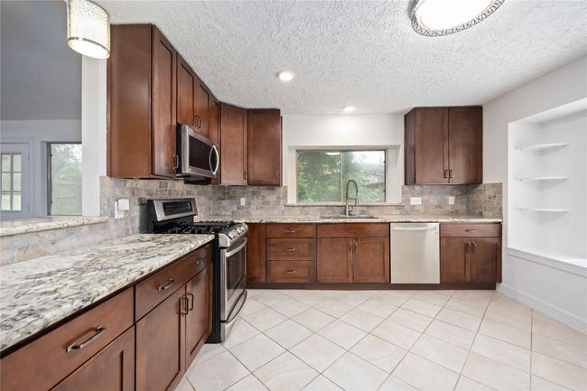 13514 Bridgepath Cv, House other with 3 bedrooms, 2 bathrooms and 2 parking in Houston TX | Image 11
