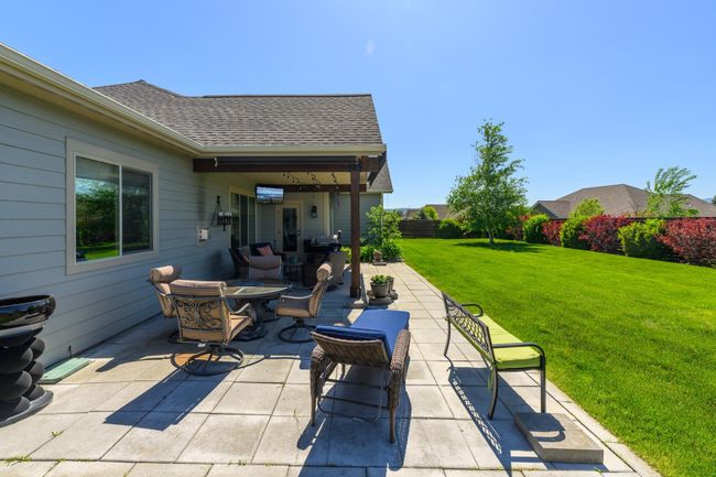 View of patio with outdoor dining area | Image 28