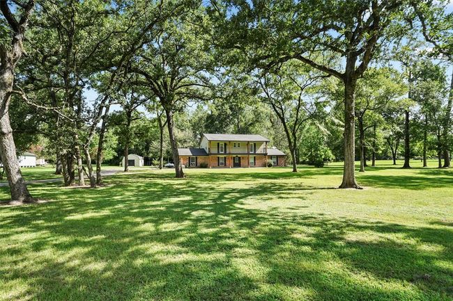 Beautifully set back home with large second floor terrace | Image 4