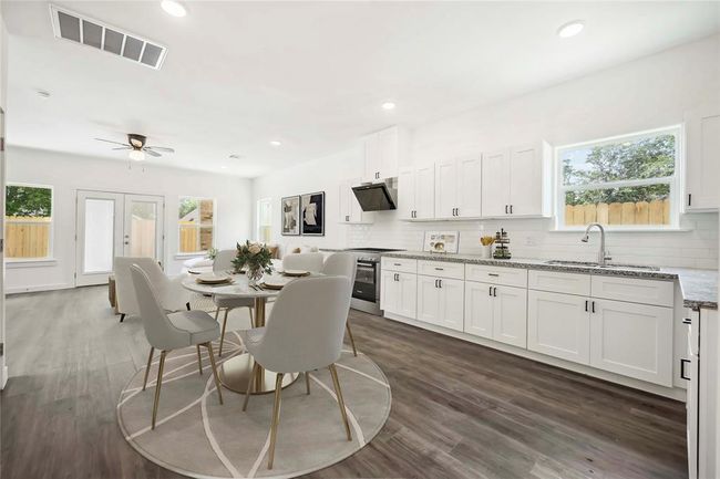 Kitchen/dining area staged | Image 11