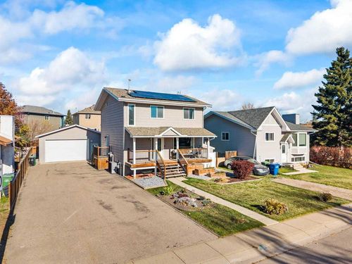 485 Big Springs Dr Se, House with 4 bedrooms, 3 bathrooms and 6 parking in Airdrie AB | Card Image