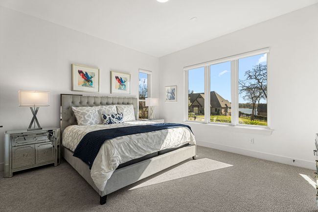 Bedroom featuring baseboards and carpet flooring | Image 22