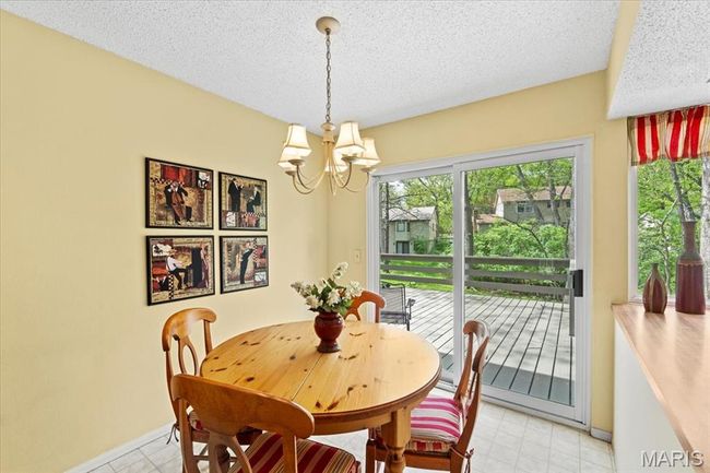 Eat in kitchen sliding doors lead to the deck | Image 14