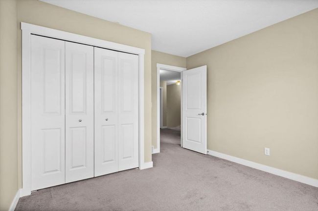 156 Rockyspring Grove Nw, Townhouse with 3 bedrooms, 3 bathrooms and 2 parking in Calgary AB | Image 32