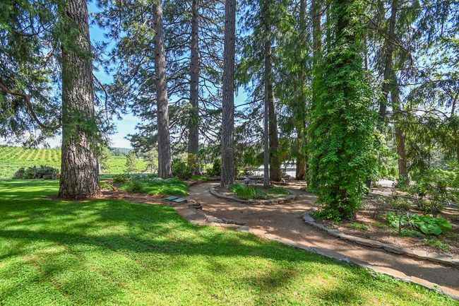 Nice walkway was built with stone wall. | Image 41
