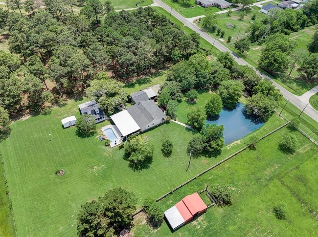 Aerial view of the expansive property. Its fenced and cross fenced for livestock. | Image 36