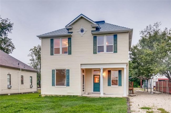 View of front of home with a detached carport | Image 27