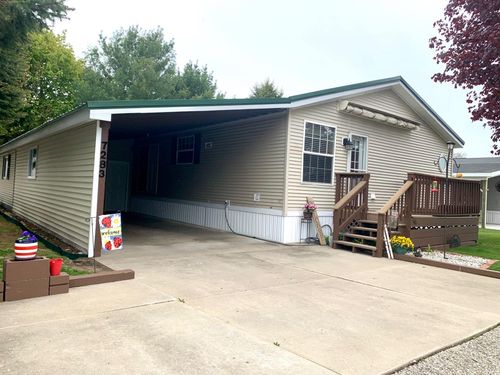 7283 White Swan Ln, Ludington, MI, 49431-9416 | Card Image