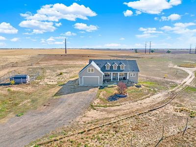 4909 S Flandin Court, House other with 3 bedrooms, 2 bathrooms and 2 parking in Strasburg CO | Image 2