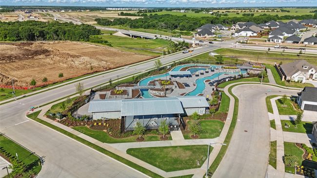 Aerial view of residential area featuring a pool area | Image 37