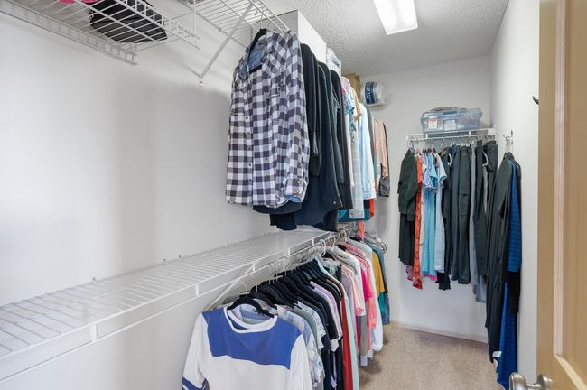 Primary bedroom walk-in closet | Image 15