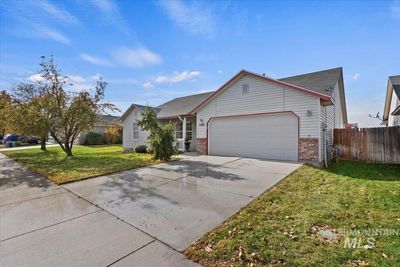 3685 N Bottle Brush Ave, House other with 4 bedrooms, 2 bathrooms and 2 parking in Boise ID | Image 3