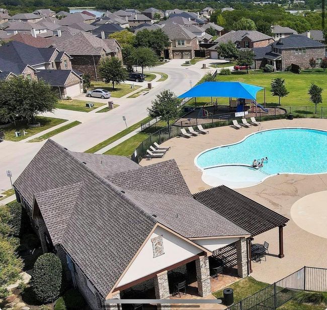 Pool with fence, a residential view, and a patio area | Image 37