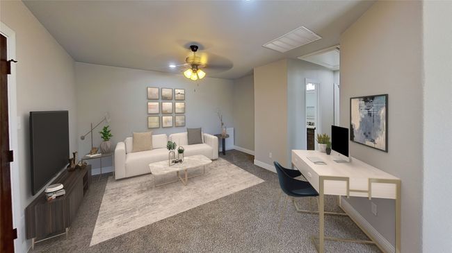 Virtually Staged. Carpeted living room featuring a ceiling fan and baseboards | Image 9
