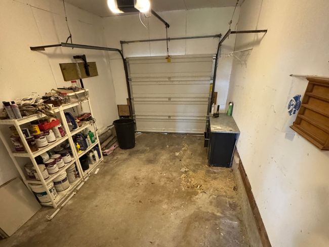 Garage with a garage door opener | Image 36