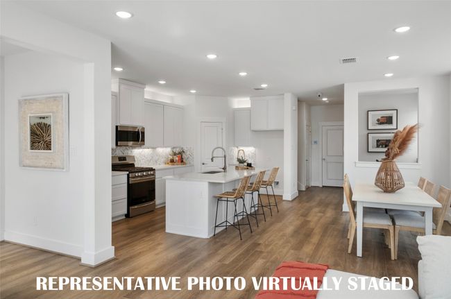 Adjacent to the kitchen, your new dining room is the perfect place to host elegant dinner parties or cozy family meals! REPRESENTATIVE PHOTO VIRTUALLY STAGED | Image 5