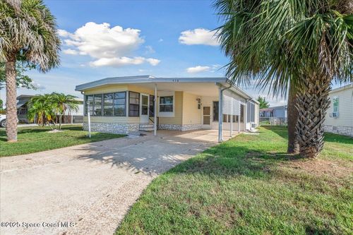 938 Wren Cir, Barefoot Bay, FL, 32976-7509 | Card Image