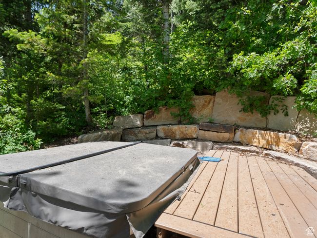 Deck featuring a hot tub | Image 21