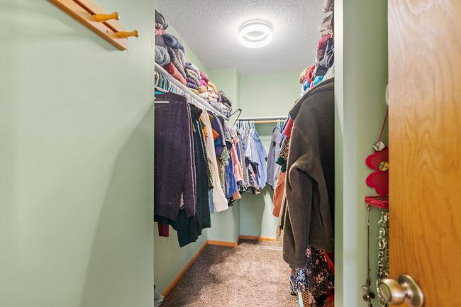 Primary bedroom walk-in closet | Image 17