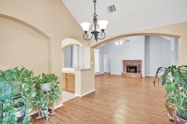 Formal dining room looking into living room. | Image 14
