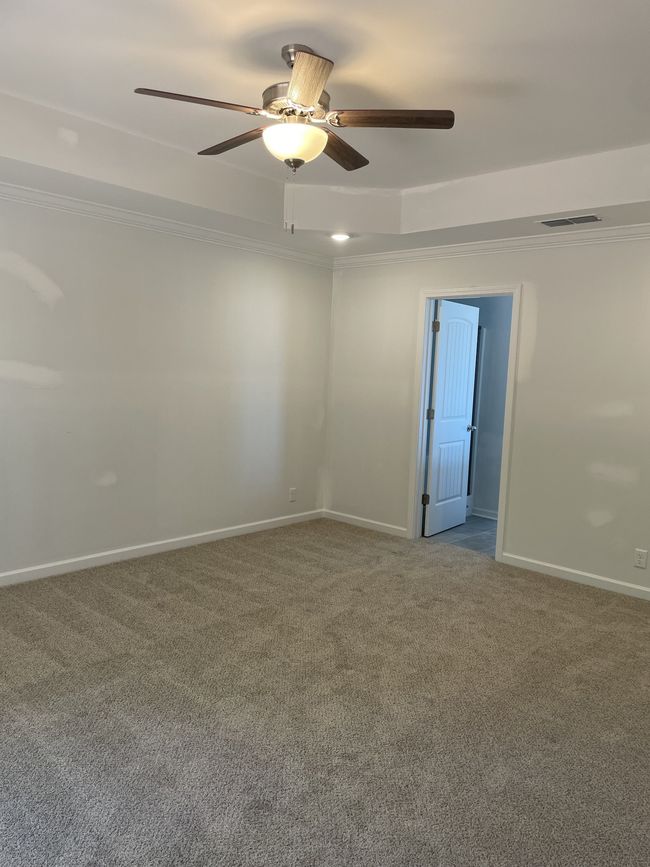 Primary bedroom with trey ceilings | Image 7