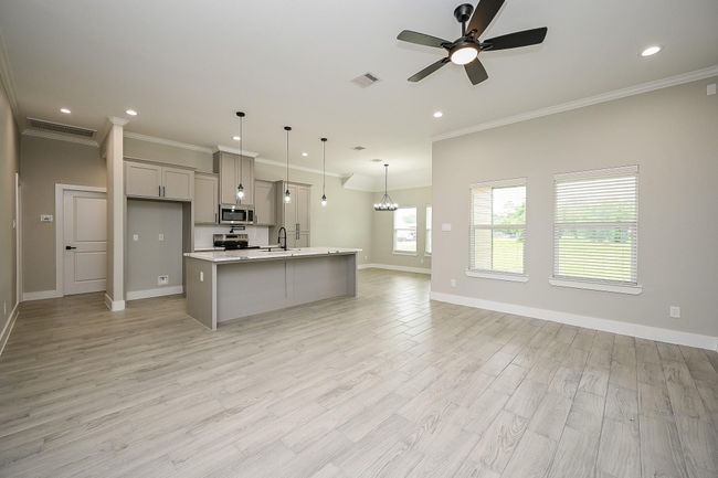 The Main Areas Of The Home is Equipped With A Lot Of Windows To Provide Natural Sunlight Inside The Home | Image 8