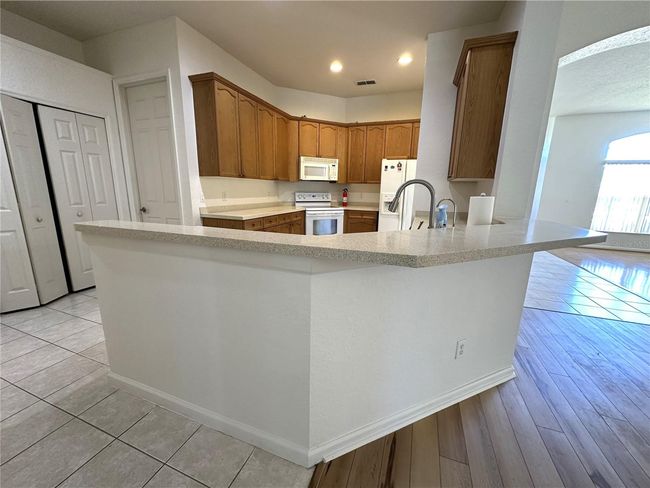 3547 Maple Ridge Loop, House other with 4 bedrooms, 2 bathrooms and null parking in KISSIMMEE FL | Image 7