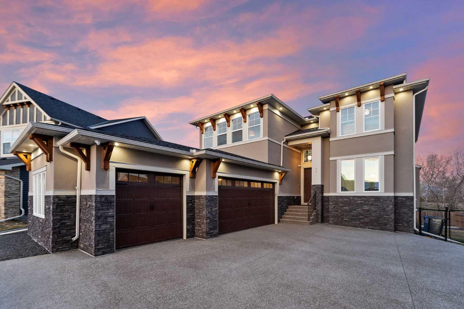 225 Kinniburgh Cove, Home with 8 bedrooms, 5 bathrooms and 6 parking in Chestermere AB | Image 1