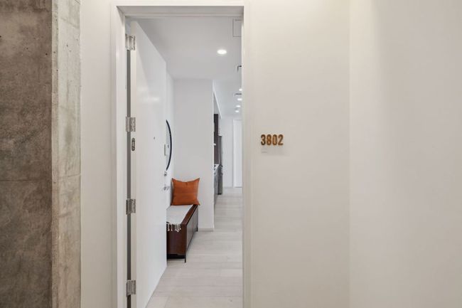 Hall with recessed lighting and light wood-style floors | Image 5