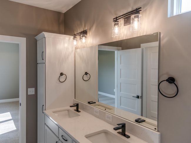 Bathroom with double vanity | Image 10