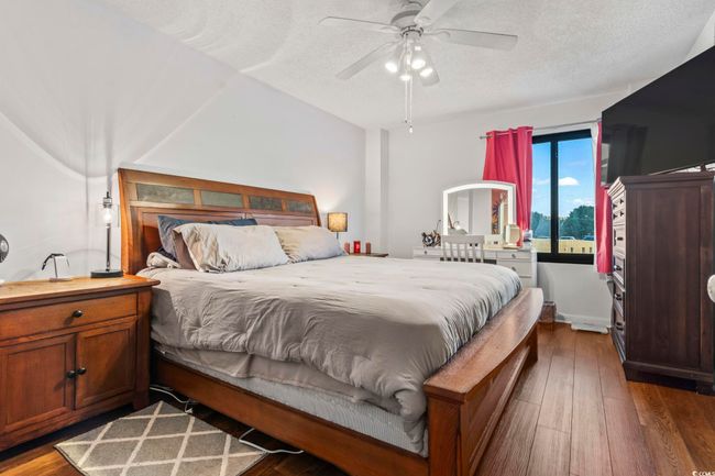 Bedroom with Access to Walk-in Closet via Beaded Entry 'Door'; and Direct Access to Bathroom. | Image 13