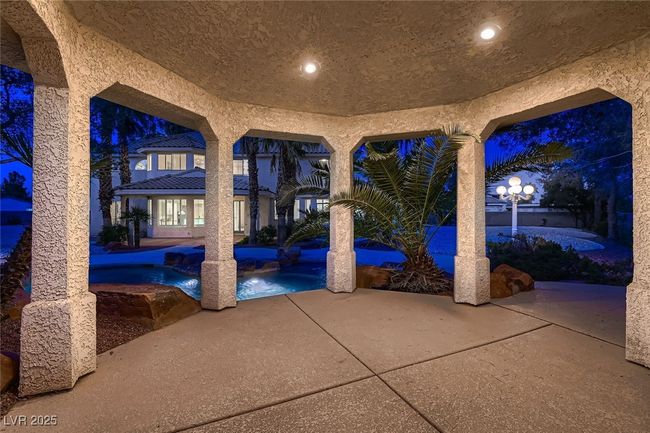 View of patio with an outdoor pool | Image 7