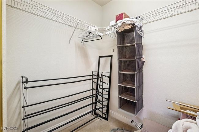 Upstairs Primary walk in closet | Image 54
