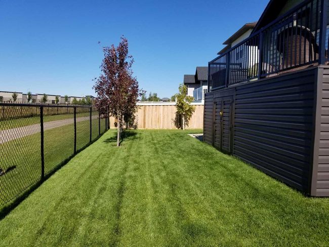 6522 Grande Banks Drive, Home with 5 bedrooms, 3 bathrooms and 6 parking in Grande Prairie AB | Image 3