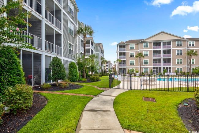 Community pool featuring a patio | Image 17