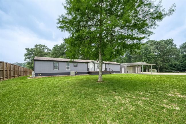 1220 Fm 222 Loop, House other with 2 bedrooms, 3 bathrooms and null parking in Coldspring TX | Image 1