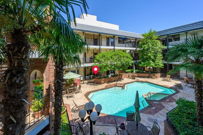 Community pool with a patio area | Image 22