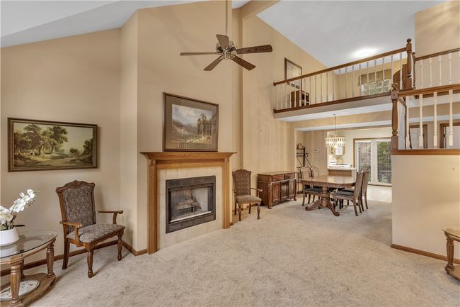 15x14 Living Room with Tile Surround Gas Fireplace and Vaulted Ceiling. | Image 5