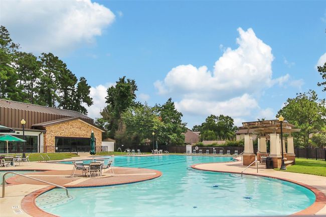 The neighborhood pool features lap lanes, a shallow end, and kiddie pool so everyone can have fun at the pool this summer. | Image 36