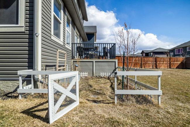 556 Boulder Creek Bay Se, Home with 3 bedrooms, 2 bathrooms and 4 parking in Langdon AB | Image 41