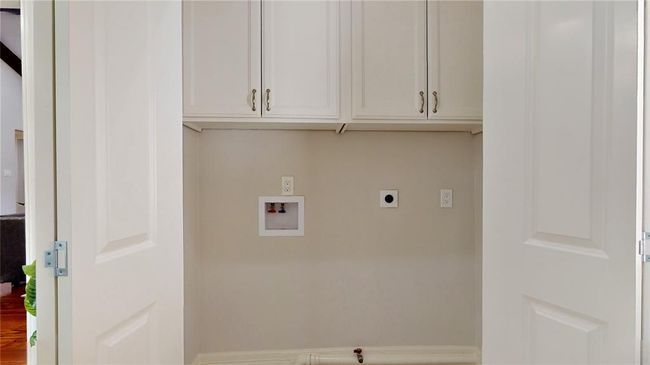 Laundry Closet by back door | Image 19