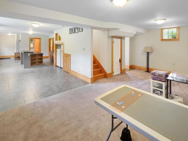 Another view of family room looking into the 2nd kitchen area. This space could easily be turned into a MIL apartment, rent it out for extra income or send the loud people downstairs as you enjoy conversation upstairs | Image 49