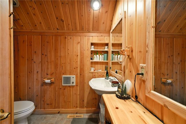Guest bath in living quarters above the detached garage. | Image 36