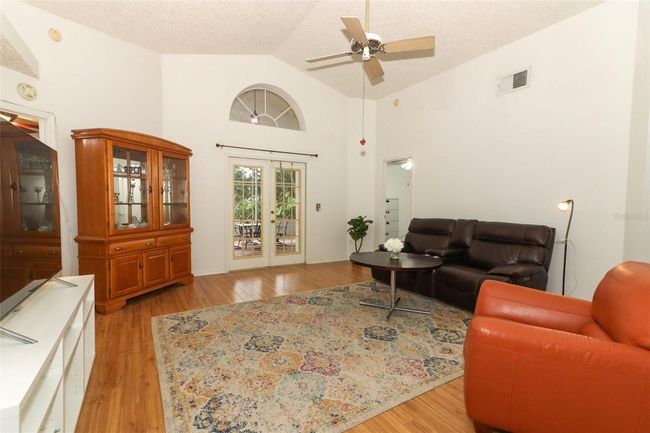 Living Room with french doors to screened patio | Image 10