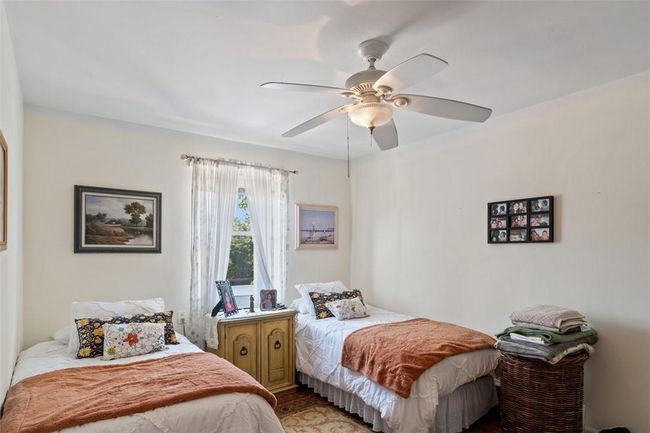 Bedroom with ceiling fan | Image 13