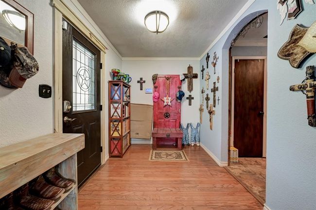 Front entry way leading to the kitchen or family room. | Image 6