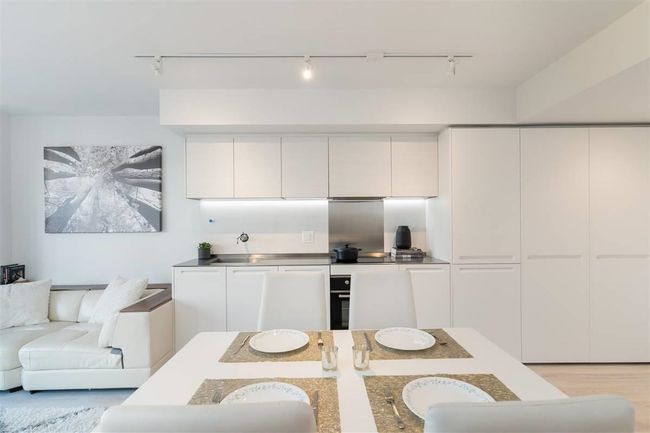 Dining room featuring rail lighting | Image 4